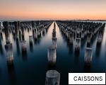 CAISSONS anagram