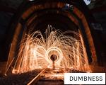 DUMBNESS anagram