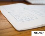 SIMONY anagram