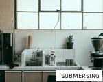 SUBMERSING anagram