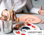 UNDERTAKE anagram