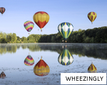 WHEEZINGLY anagram